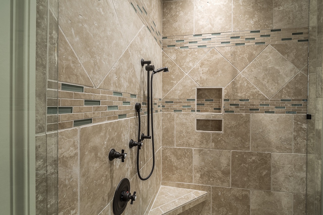 spacious and stylish design walk in shower A spacious walk in shower designed with tile and black fixtures
